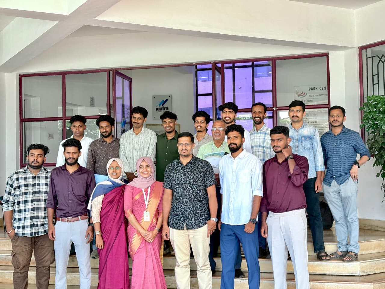 Students and staff group photo near KINFRA building.